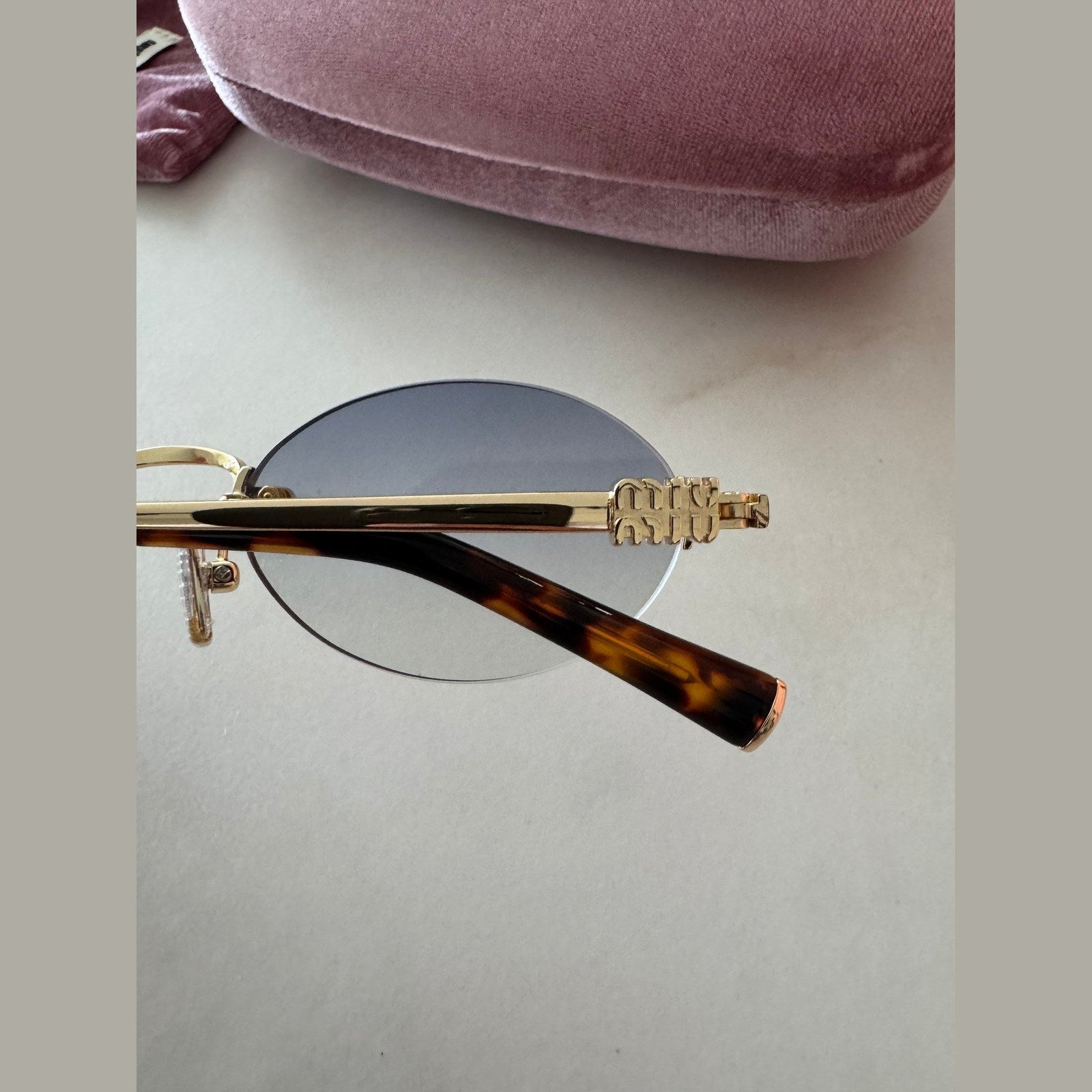 מיו מיו Oval