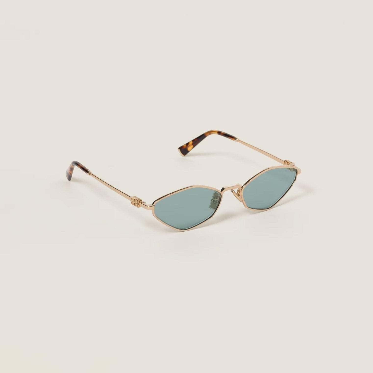 Metal diamond-shaped Miu Miu sunglasses in rose gold with adjustable nose pads.