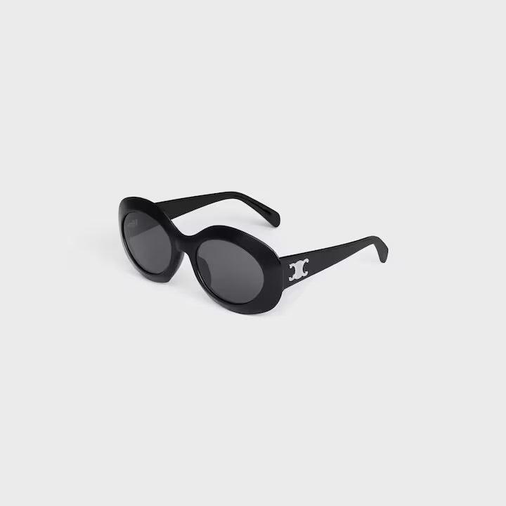 Celine sunglasses with logo, elegant round black frame, UV400 lenses.