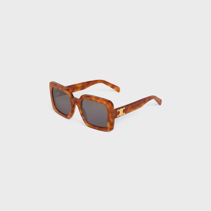 Image of Celine sunglasses with brown frame and C logo, featuring high-quality UV400 lenses.