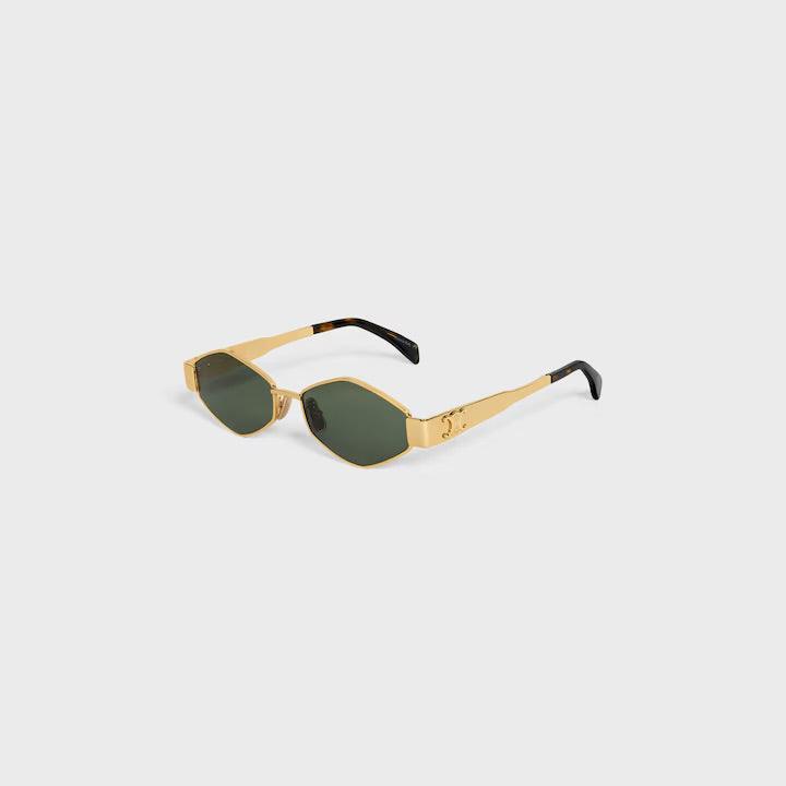 Celine sunglasses with gold frame and green lenses on a light gray background.