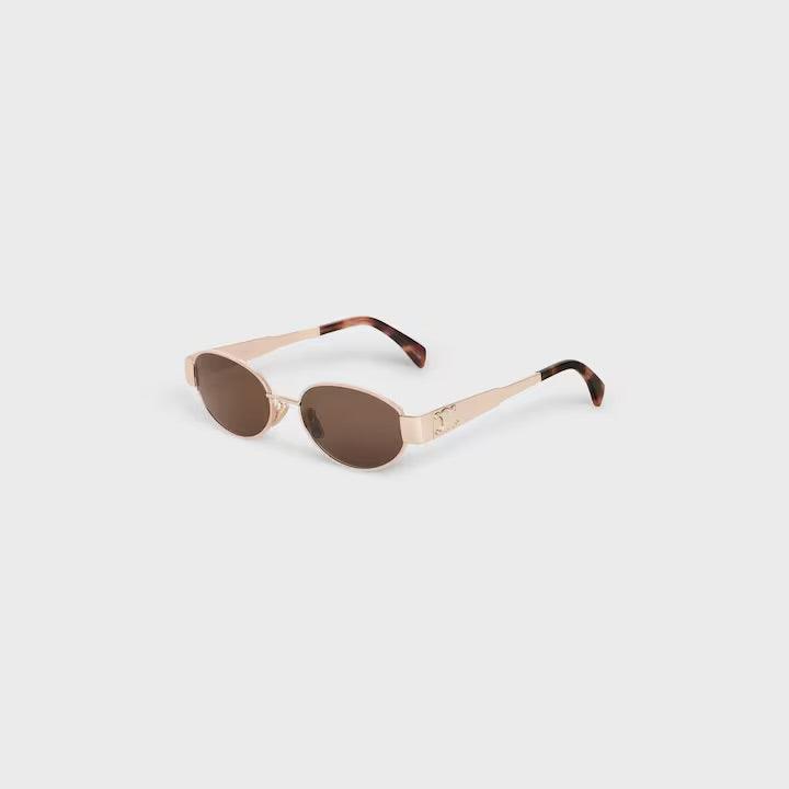 Image of Celine sunglasses with sleek gold frames and dark lenses, offering full UV400 protection.