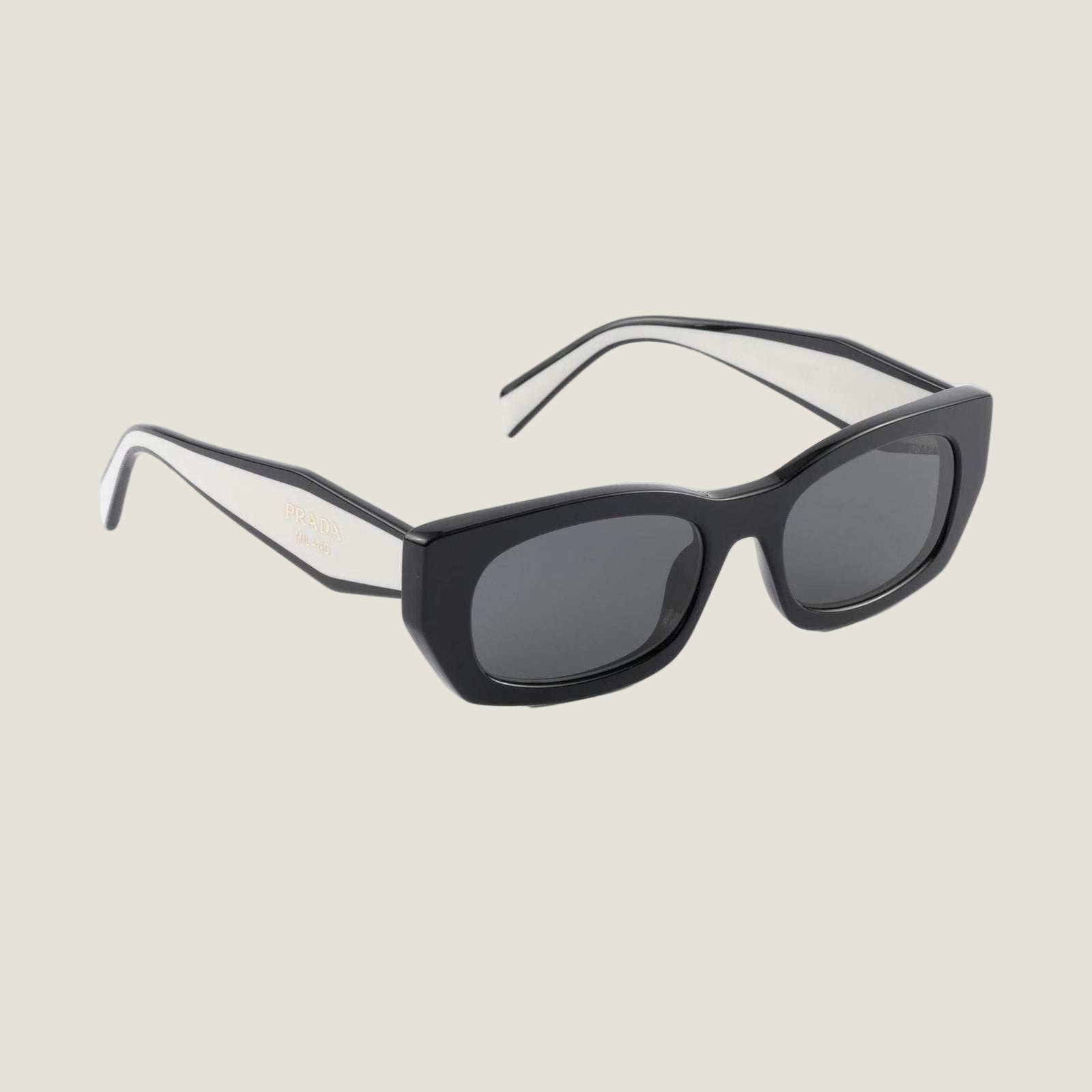 Image of PRADA sunglasses with logo, sleek black geometric frames, UV400 lenses.