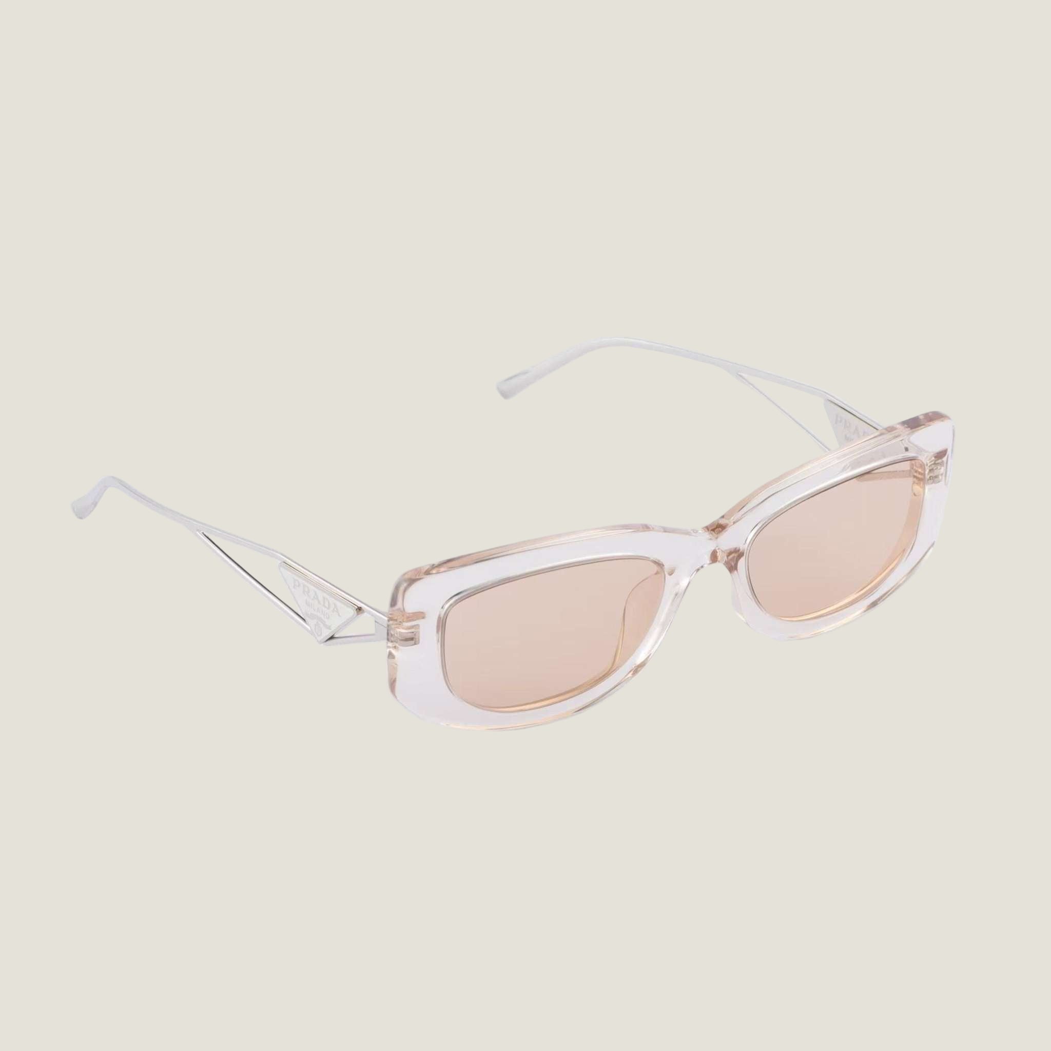Image of Prada logo sunglasses with geometric frames and bold design.