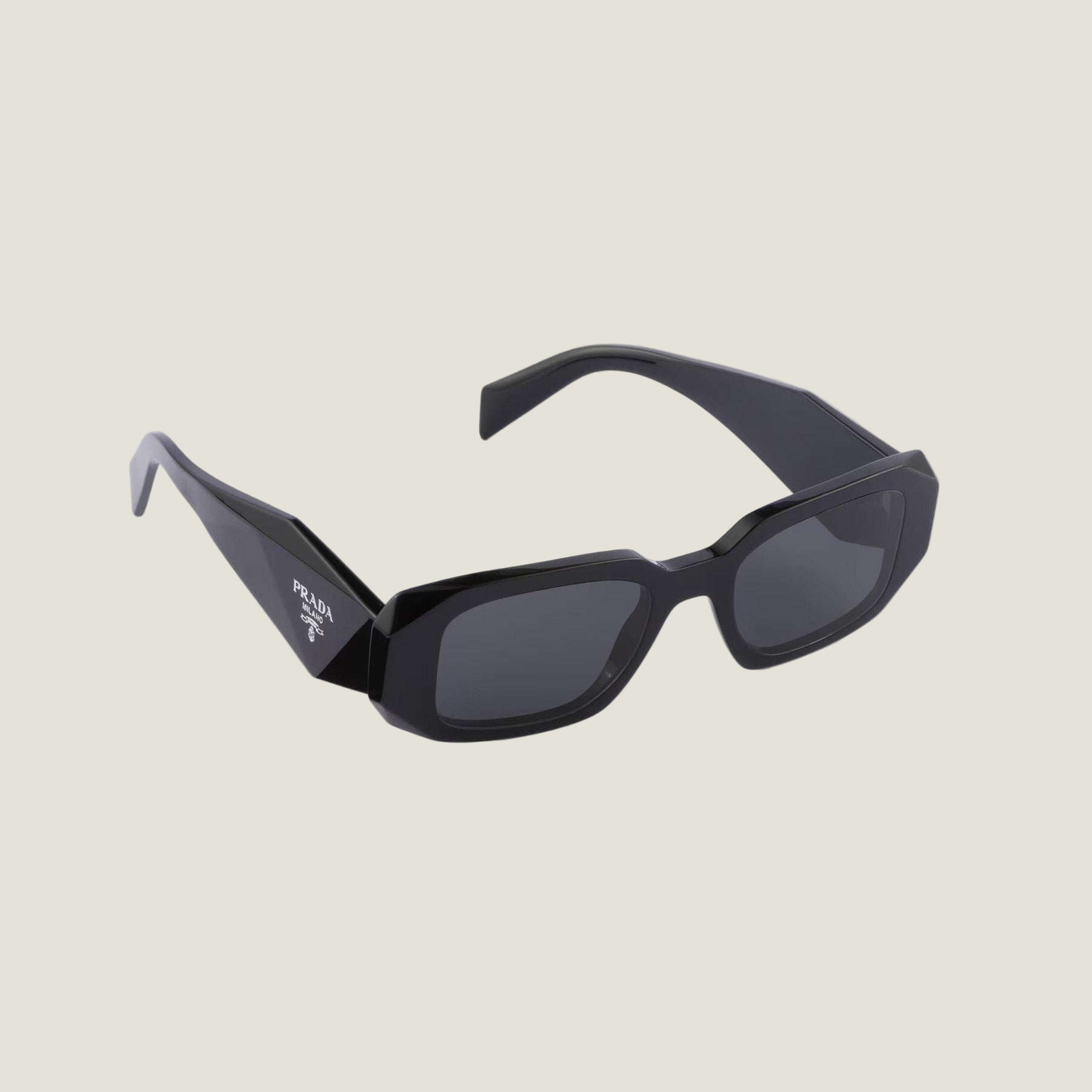Image of PRADA sunglasses with logo, geometric frames, black color.