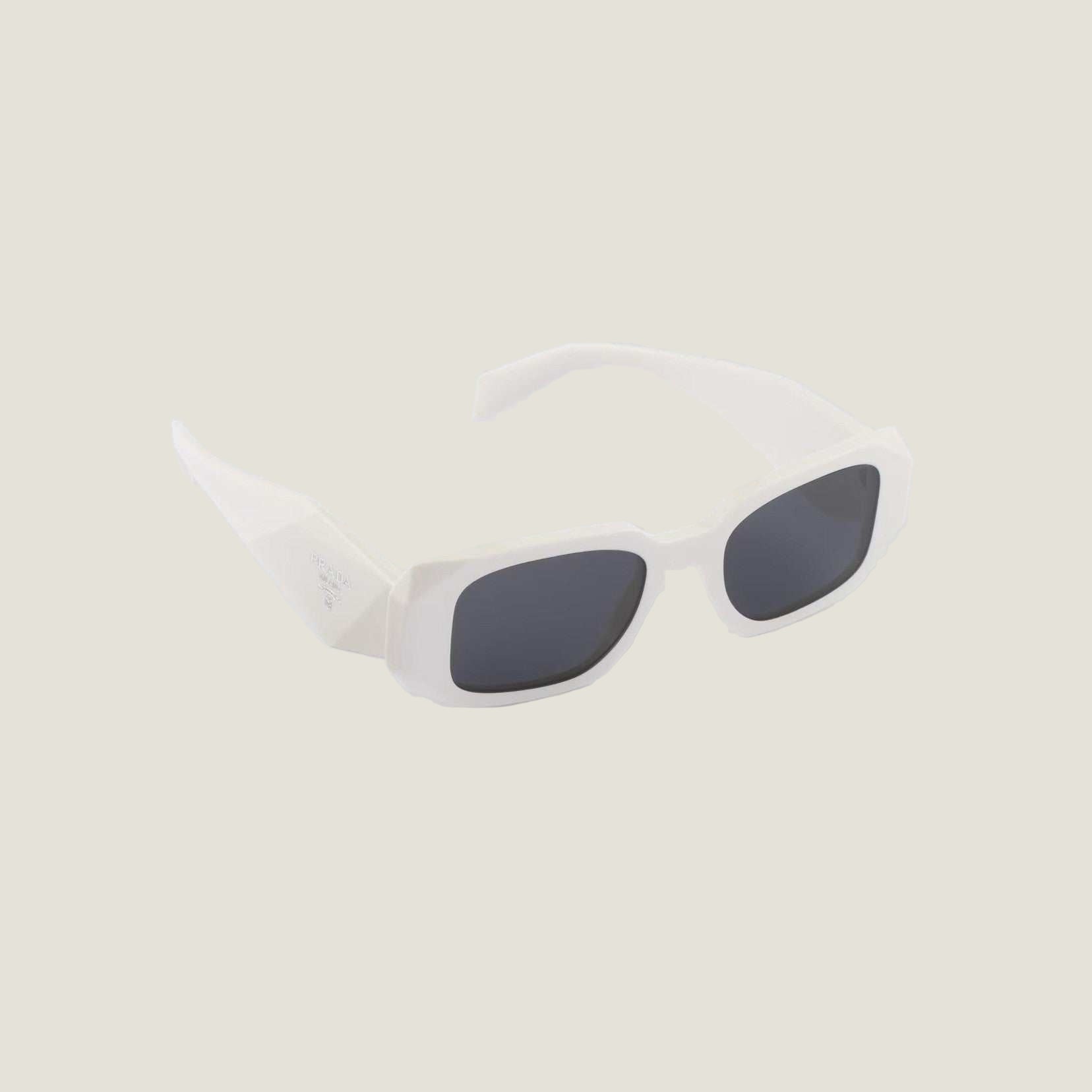 Image of Luxury Prada logo sunglasses with sleek geometric design.