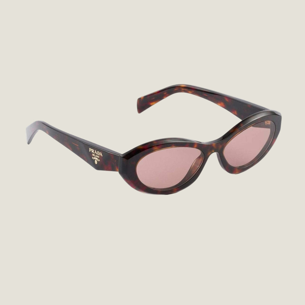Prada sunglasses with logo, geometric frames, bold colors, luxury Italian design.