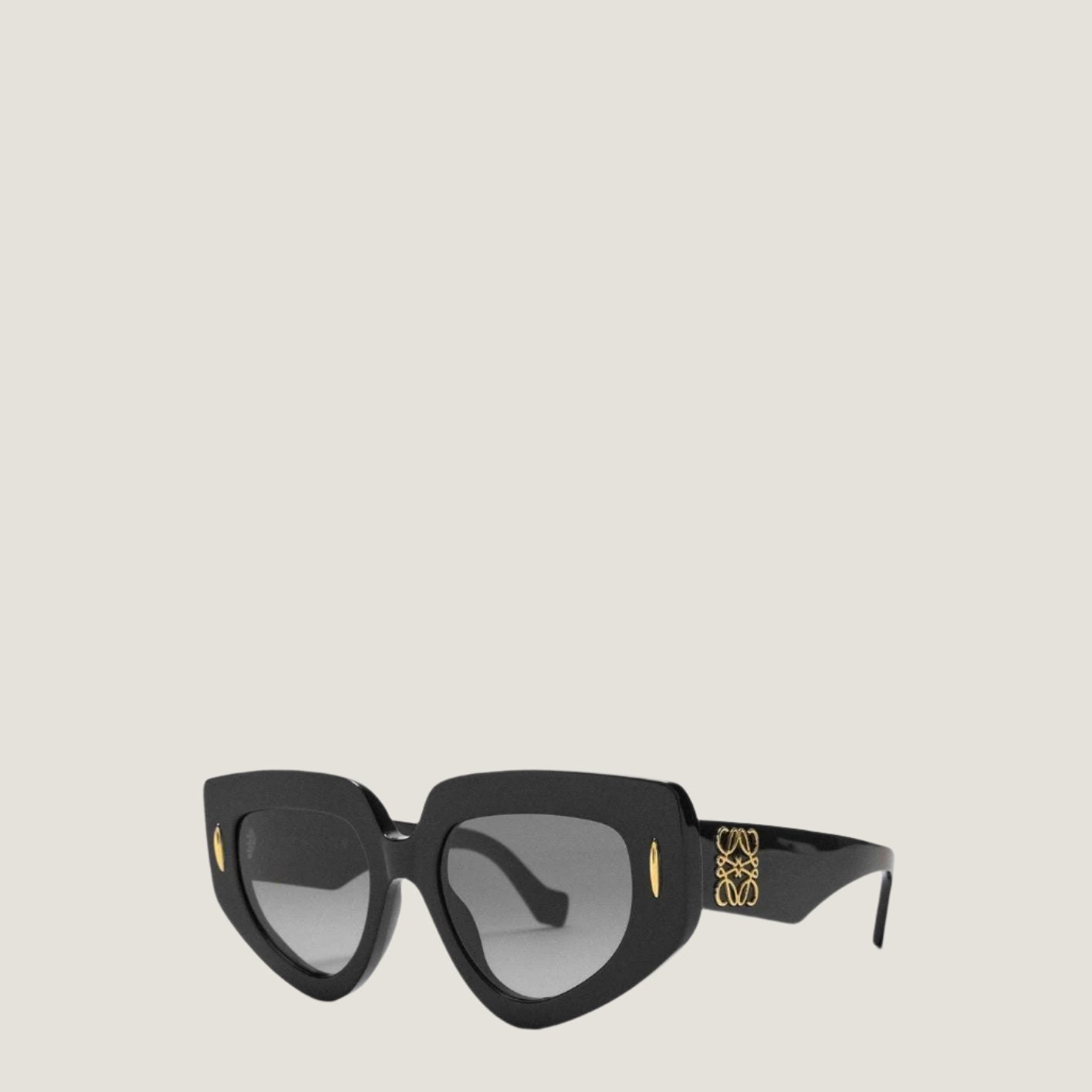 Image of Modern LOEWE sunglasses with artistic geometric frames and UV400 protection.