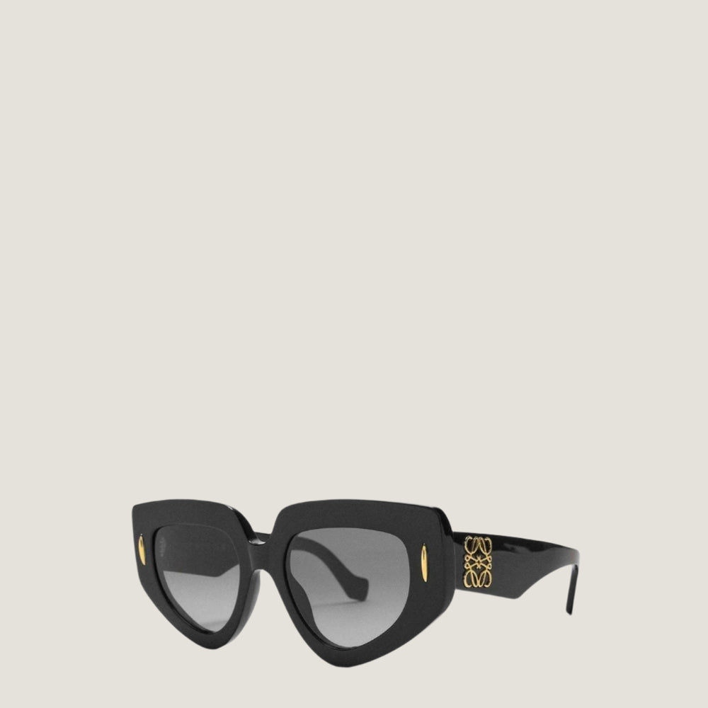 Modern LOEWE sunglasses with artistic geometric frames and UV400 protection.