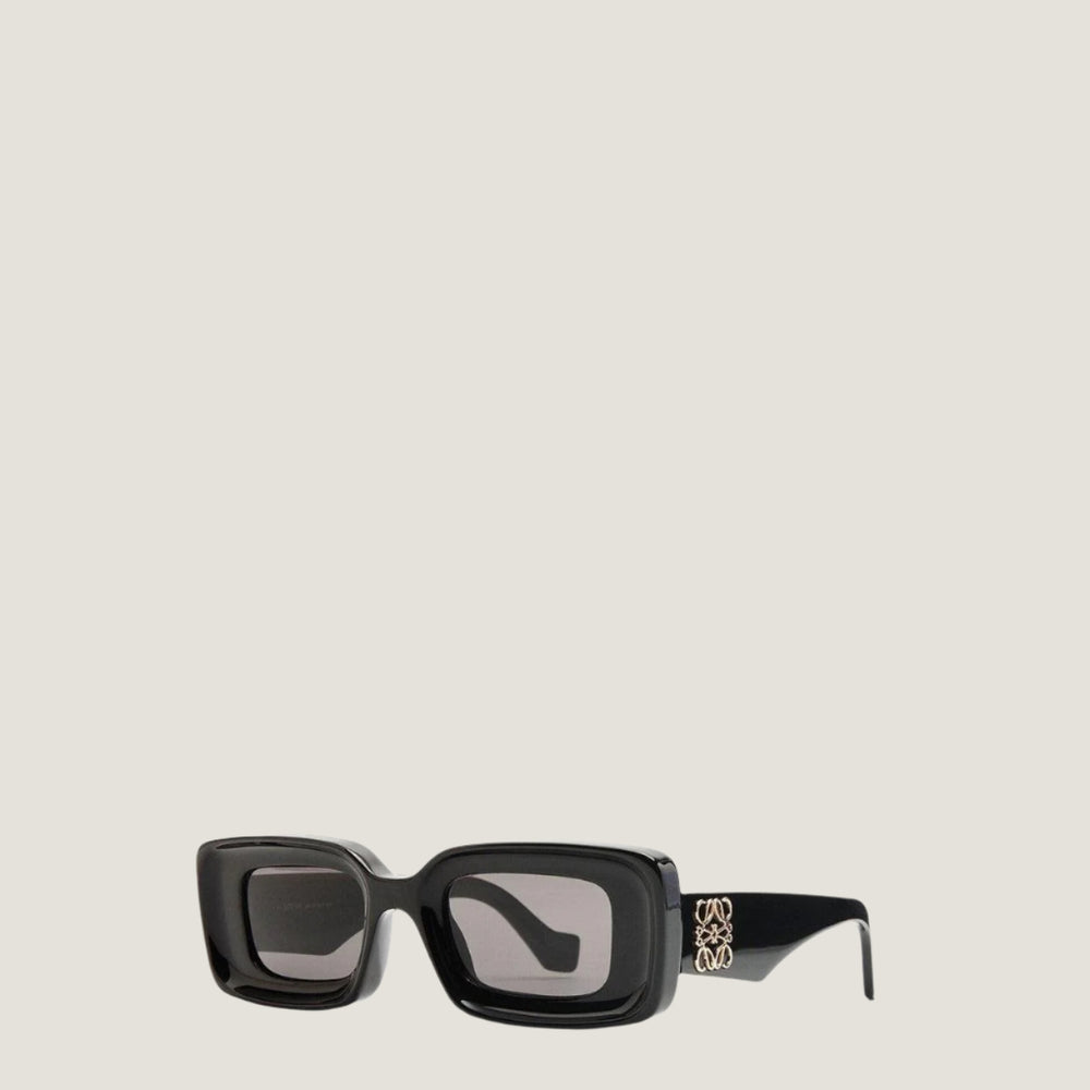 LOEWE sunglasses with geometric black frames and UV400 protection.