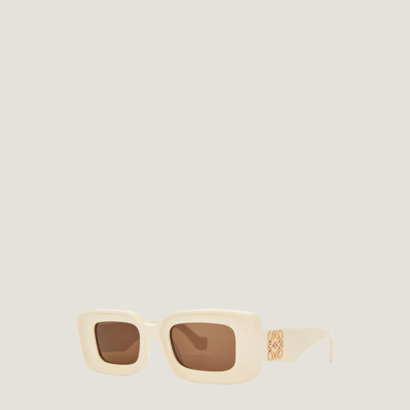 Image of LOEWE sunglasses with geometric frame and brown lenses.