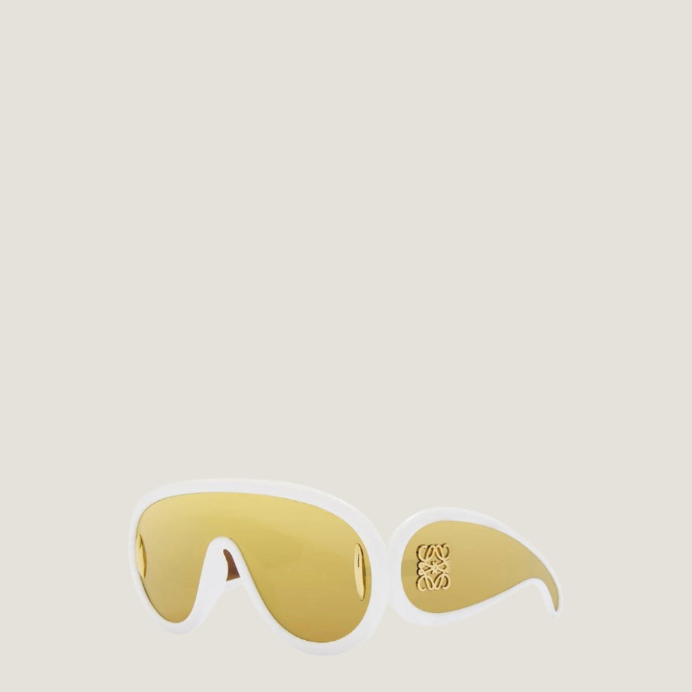 Modern LOEWE sunglasses with geometric frames and UV400 protection.