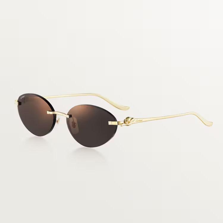 Cartier sunglasses with gold-plated metal frame and UV400 lenses.