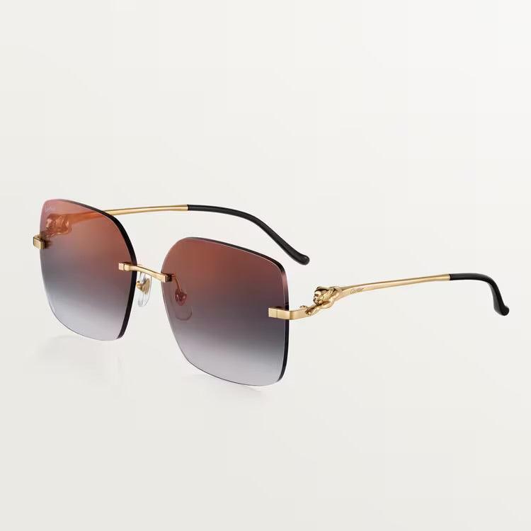 Luxury Cartier sunglasses with gold-plated metal frame and UV400 lenses, unisex design.