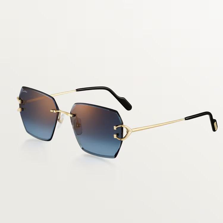 Cartier sunglasses with gold metal frame and UV400 lens protection.