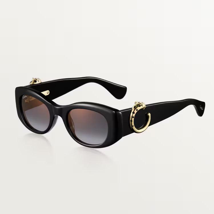 Image of Cartier luxury sunglasses with black frame and dark lenses, featuring gold accents, suitable for both men and women.