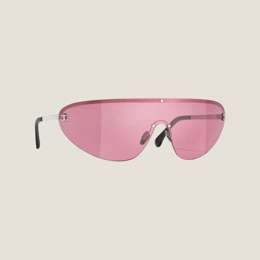 משקפי שמש CHANEL אלגנטיים עם עדשות ורודות ולוגו המותג.