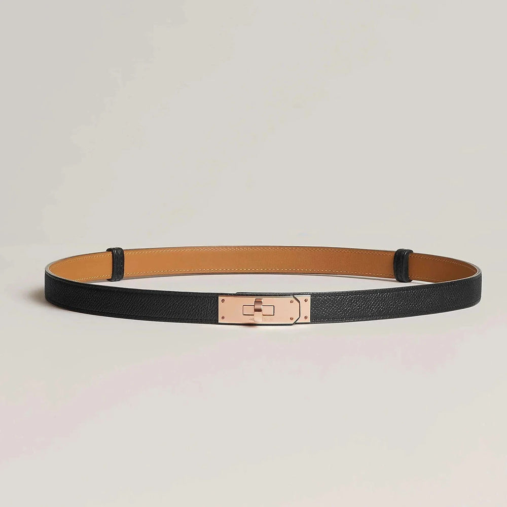 Hermes Kelly leather belt with minimalist metallic buckle in black.