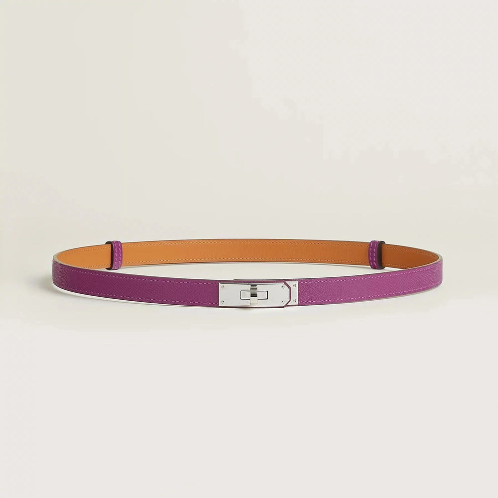 Hermès Kelly leather belt in premium quality, featuring a sleek metallic buckle and minimalist design.