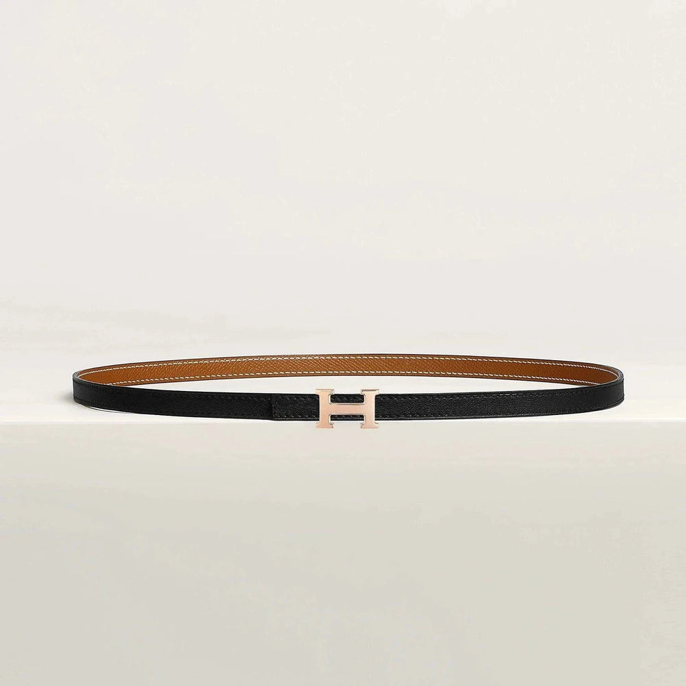 Hermès belt with elegant metallic buckle, premium quality leather, versatile for men and women.