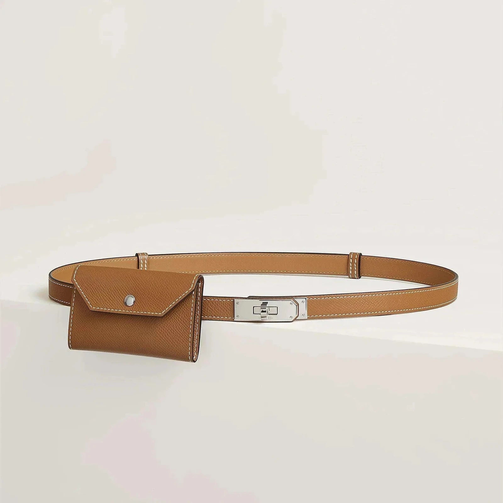 Image of חגורה קלי תיק Hermès, יוקרתית מעור פרימיום עם אבזם מתכתי כסוף, עיצוב אלגנטי, מתאימה לכל סגנון.