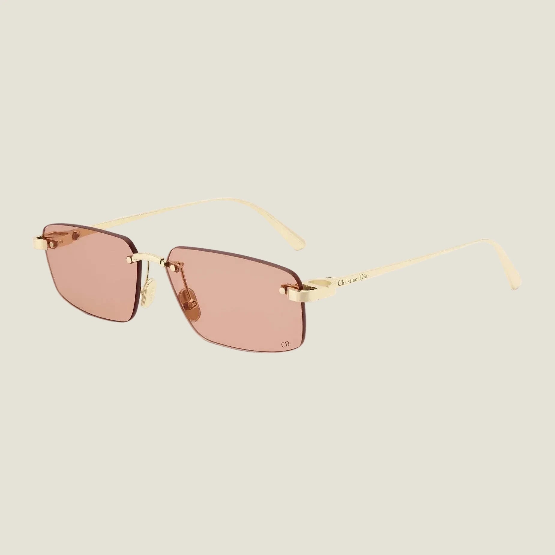 Image of Dior sunglasses with geometric frame and brown lenses