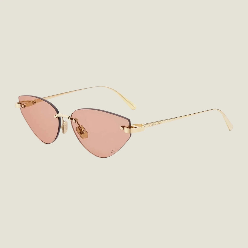 Dior sunglasses with bold geometric frames and pink lenses, featuring UV400 protection.