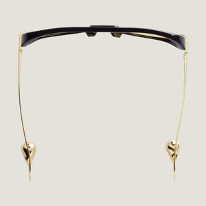 משקפי שמש B עם מסגרת מתכת שחורה והגנה מלאה מפני קרני UVA/UVB.