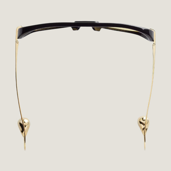 משקפי שמש B עם מסגרת מתכת שחורה והגנה מלאה מפני קרני UVA/UVB.