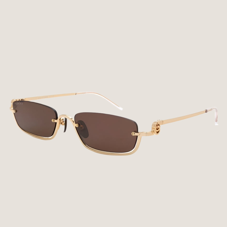 Rectangular GG sunglasses with brown lenses and gold metal frame.