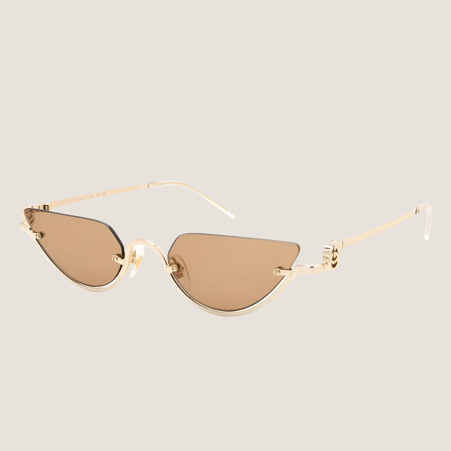 Image of Gucci sunglasses with gold frames and brown lenses, featuring iconic luxury design, UV400 protection.