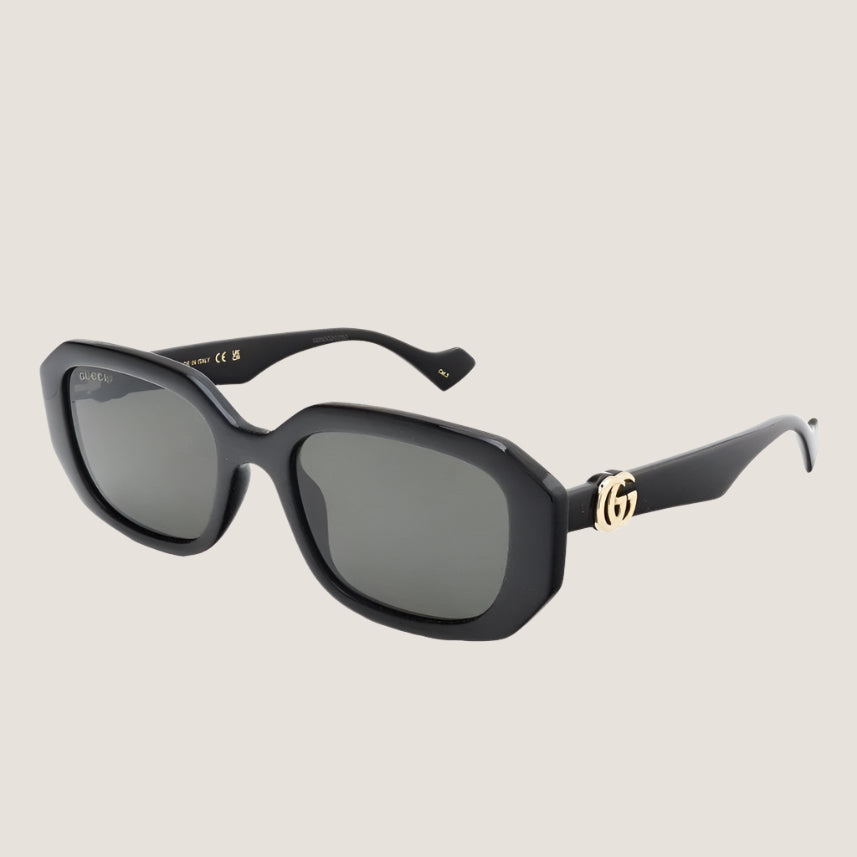 Gucci sunglasses with iconic design and luxury style featuring UV400 lenses and black frames.