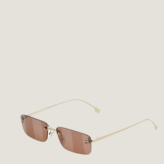 Image of Fendi luxury sunglasses with gold frame and UV400 lenses.