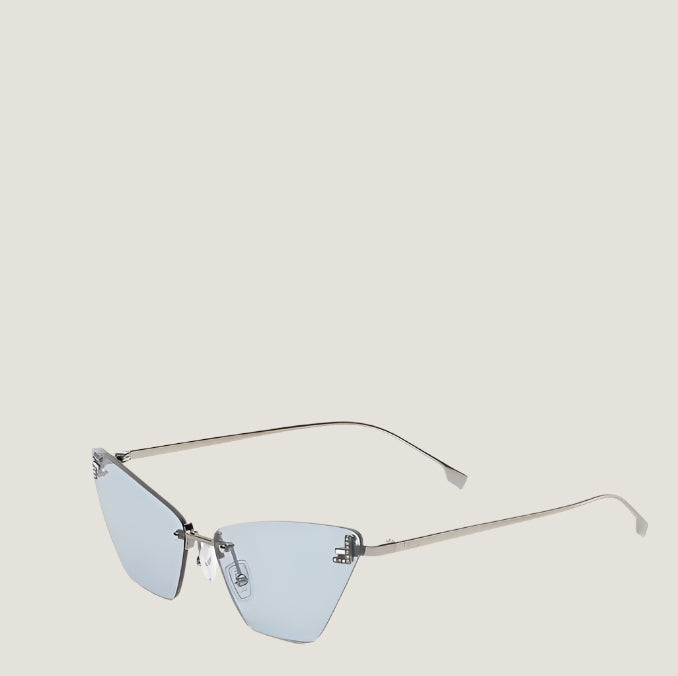 Fendi luxury sunglasses with sleek blue lenses and minimalist metal frame.