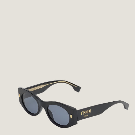Fendi luxury sunglasses with black frames and branding detail.