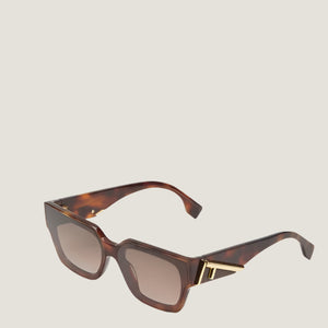 Fendi sunglasses with tortoiseshell frames and UV400 lenses for luxury fashion style.