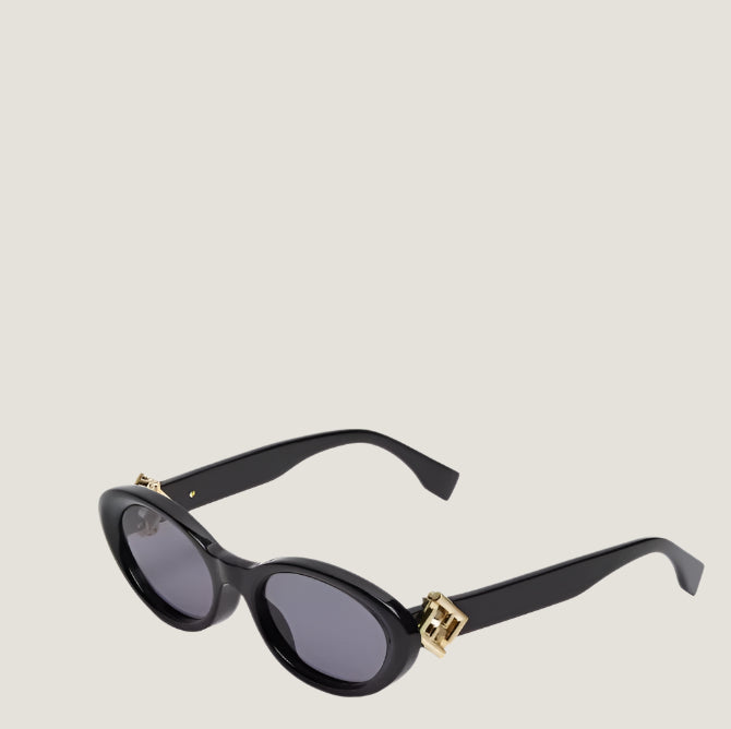 Fendi luxury sunglasses with black frames and oval lenses.