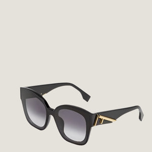Fendi luxury sunglasses with black frame and gold accents, featuring UV400 lenses.