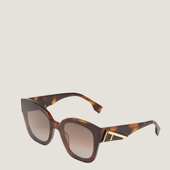 Image of Fendi luxury sunglasses with tortoiseshell frame and dark lenses, iconic Italian design.