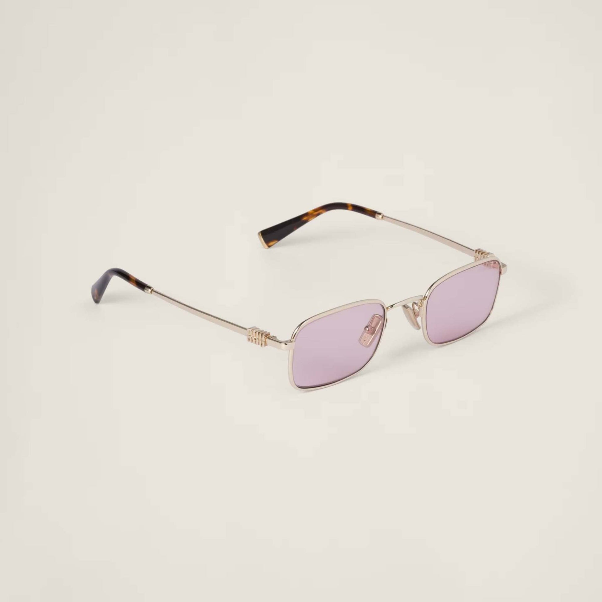 Miu Miu rectangular sunglasses with gold metal frame and adjustable nose pads.