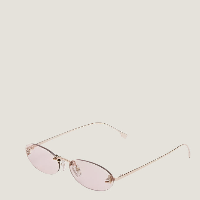 Image of Fendi sunglasses with oval frames and UV400 protection, showcasing luxurious Italian design.