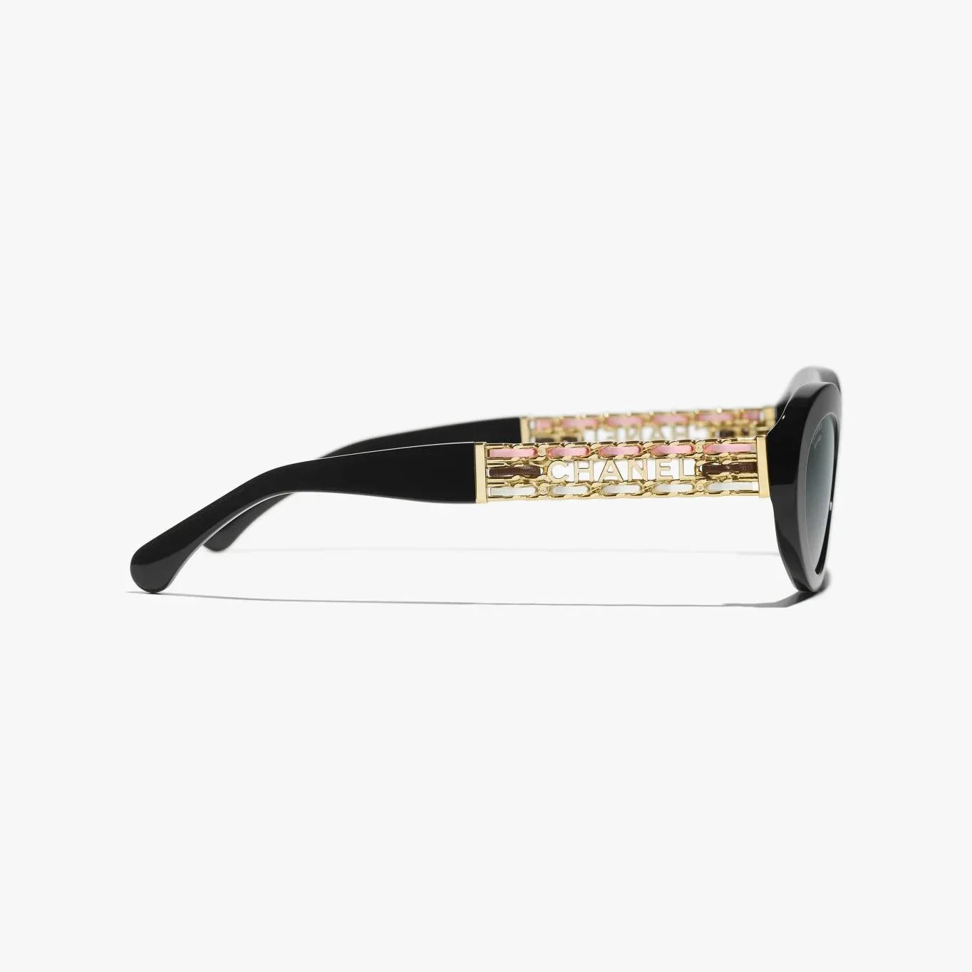 Image of CHANEL sunglasses with black and gold plastic frame, UVA/UVB protection.