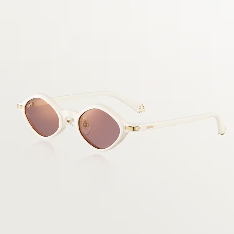 Image of White Cartier sunglasses with plastic frame, adjustable nose pads, and 100% UVA/UVB protection.