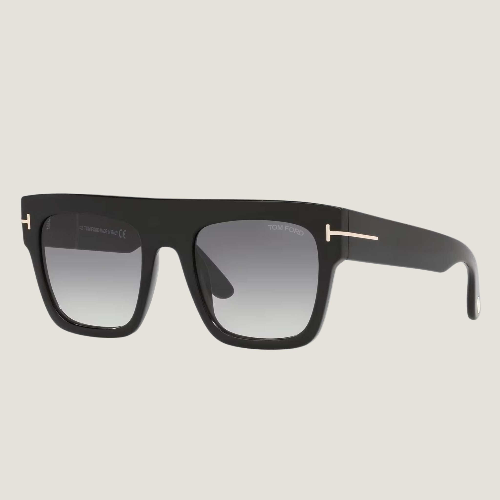 Image of Stylish TOM FORD sunglasses with premium black frame and UV400 protection.