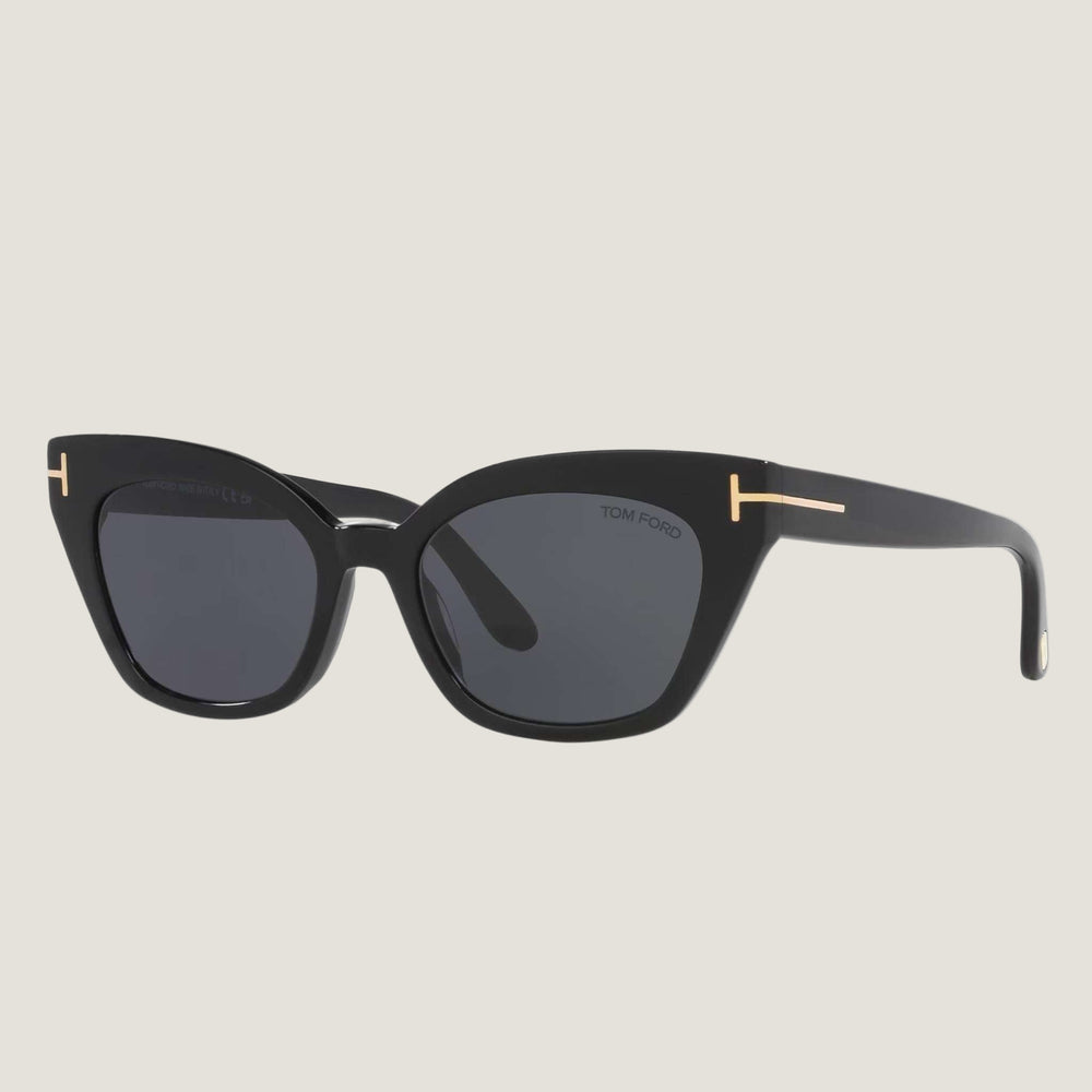 TOM FORD sunglasses with black frames and UV400 protection.