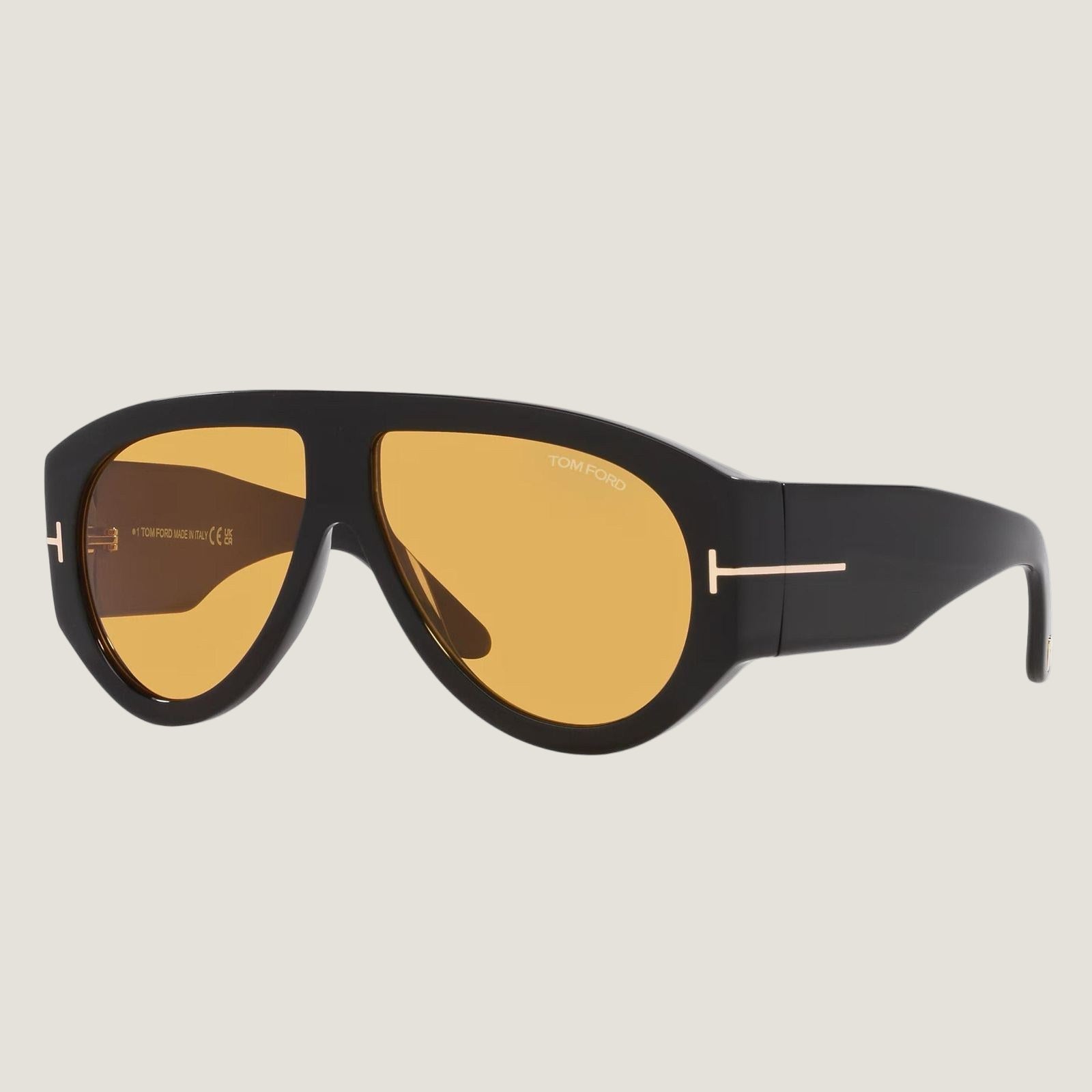 Image of TOM FORD sunglasses, black plastic frame, UVA/UVB protection, adjustable nose pads, with brand packaging.