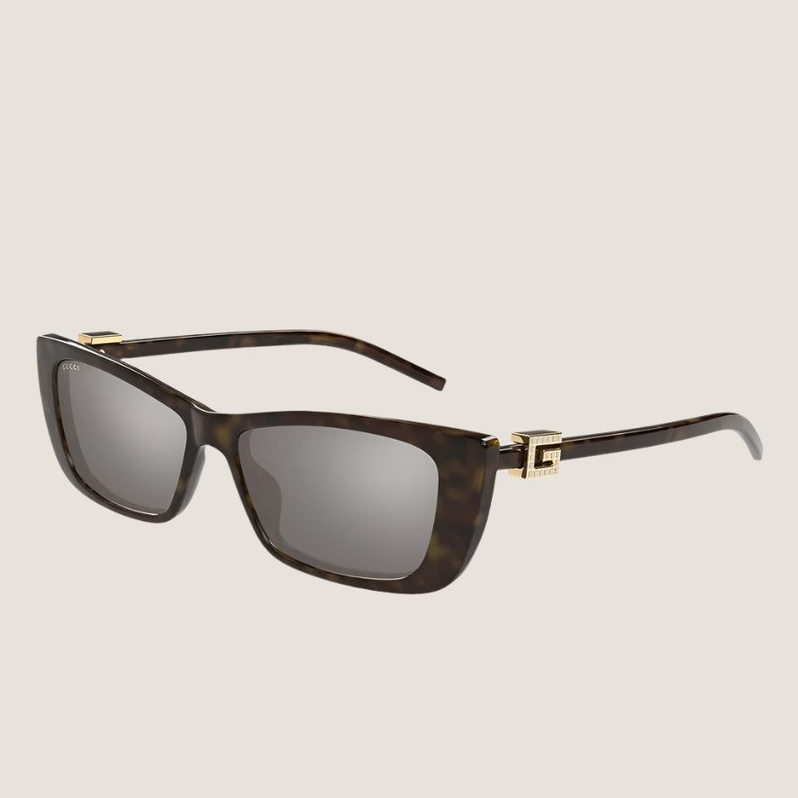 Image of Gucci sunglasses, luxury eyewear, iconic style, premium UV400 protection.