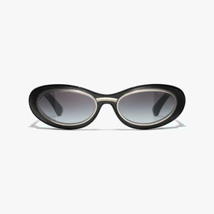 CHANEL sunglasses, black and silver, plastic and metal frame, UVA/UVB protection, adjustable nose pads.