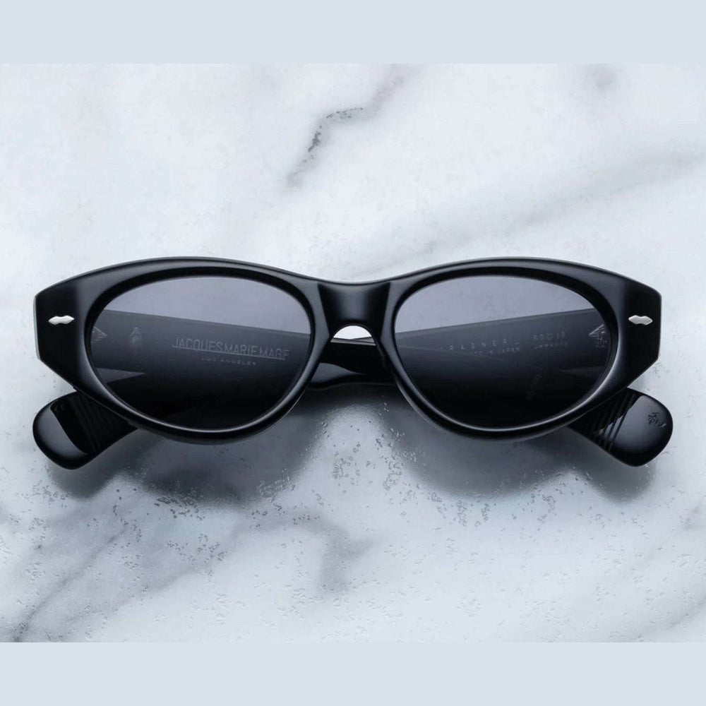 Jacques Marie Mage - KRASNER שחור, משקפי שמש, מסגרת פלסטיק, צבע שחור, הגנה UVA/UVB, רפידות אף מתכווננות, מראה אלגנטי, אריזה ייעודית.