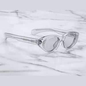 משקפי שמש שקופים Jacques Marie Mage KRASNER עם מסגרת פלסטיק שקופה והגנת UVA/UVB.